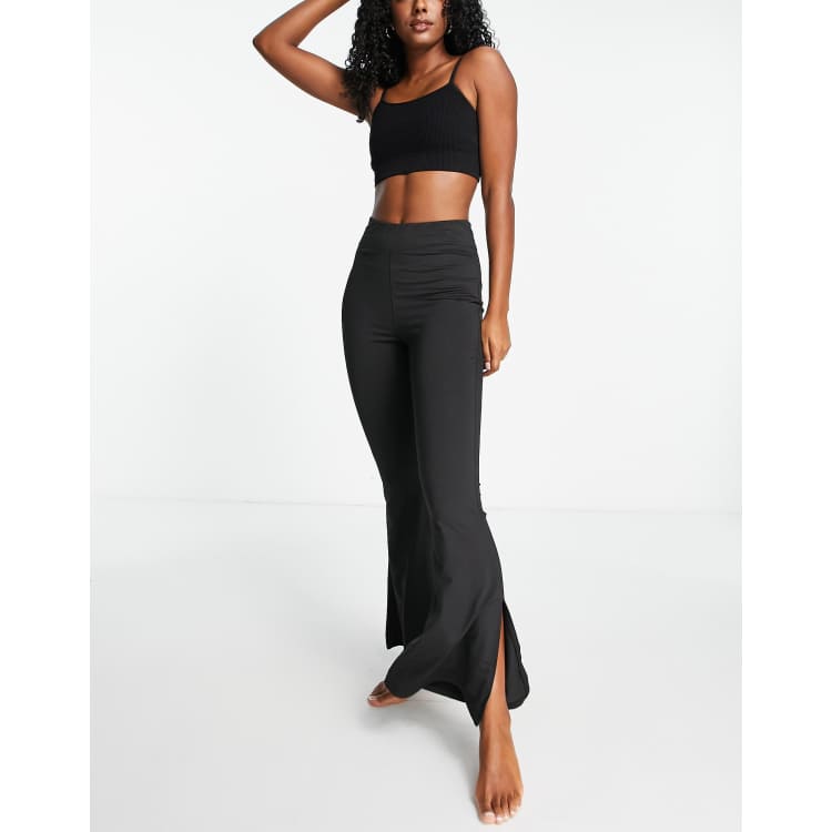 DAYFLEX HIGH WAISTED SPLIT HEM FLARED YOGA PANT - SHADOW BLACK – TALA