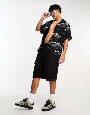 HUF drop top resort short sleeve revere collared shirt in black with all over print