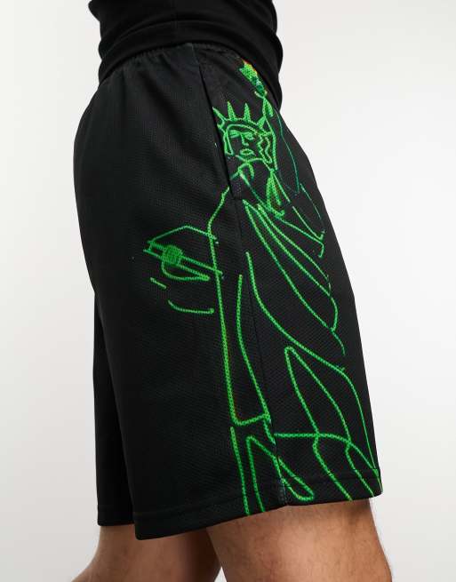 Black and green store basketball shorts