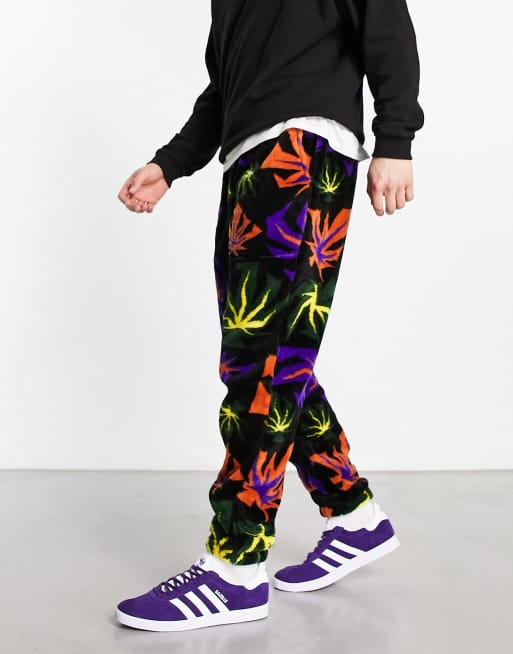 HUF Lowell jacquard sherpa trackies in black with all-over leaf print (Part of a set)