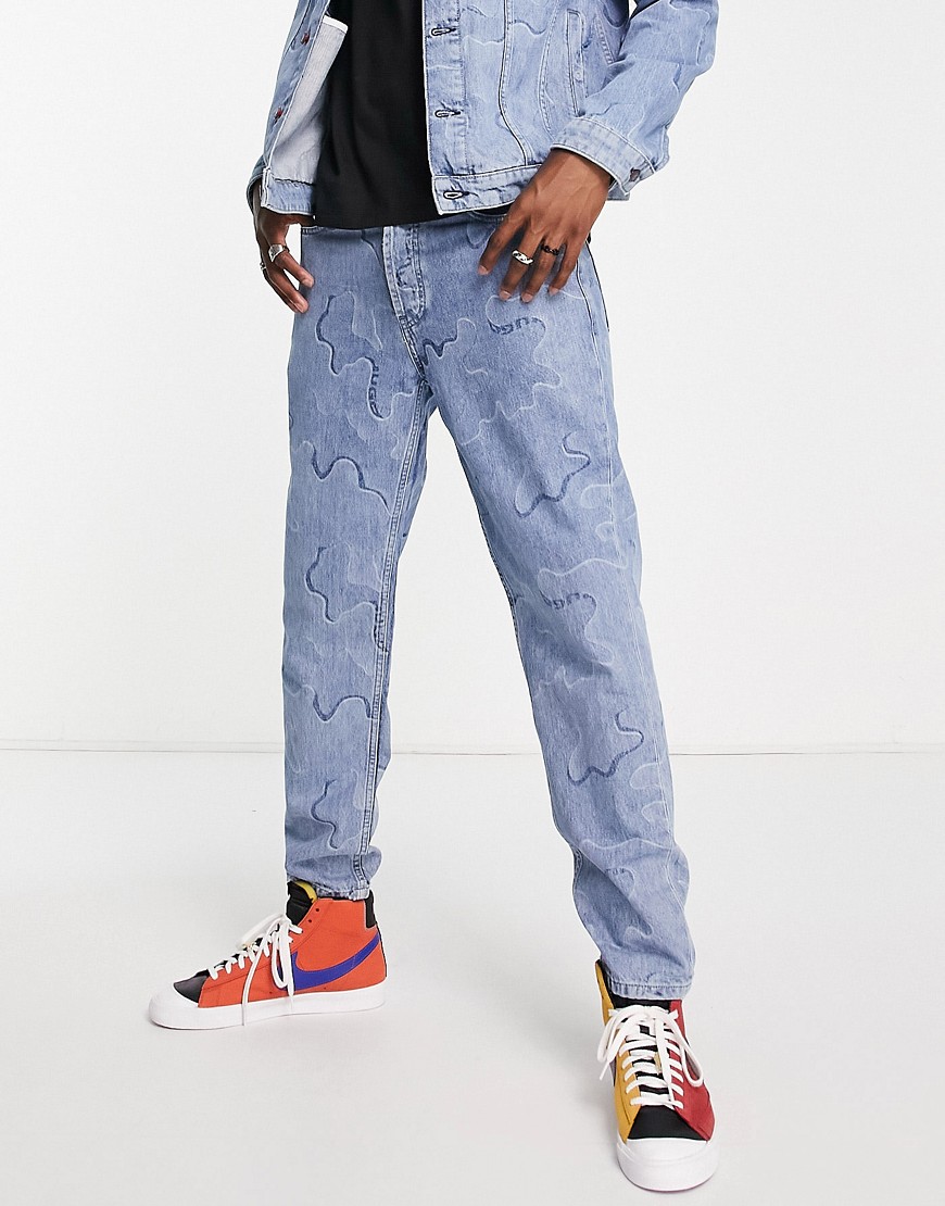 HUGO 634 tapered fit jeans in bright blue with all over print