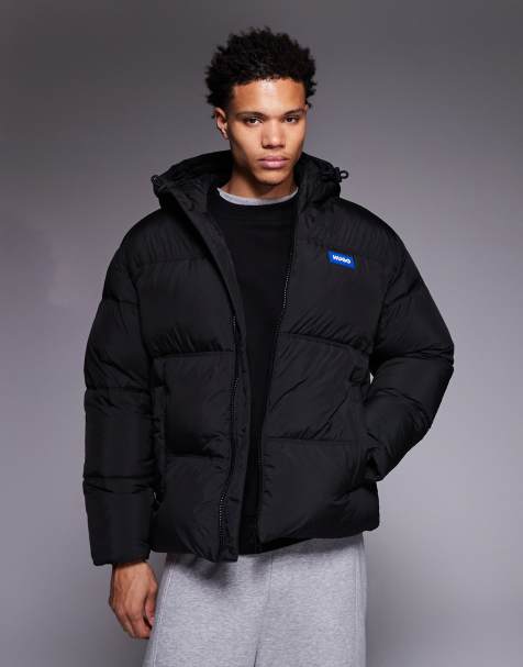 HUGO Blue – Bodo – Relaxed-Fit-Steppjacke in Schwarz mit Kapuze und Logo - view 1