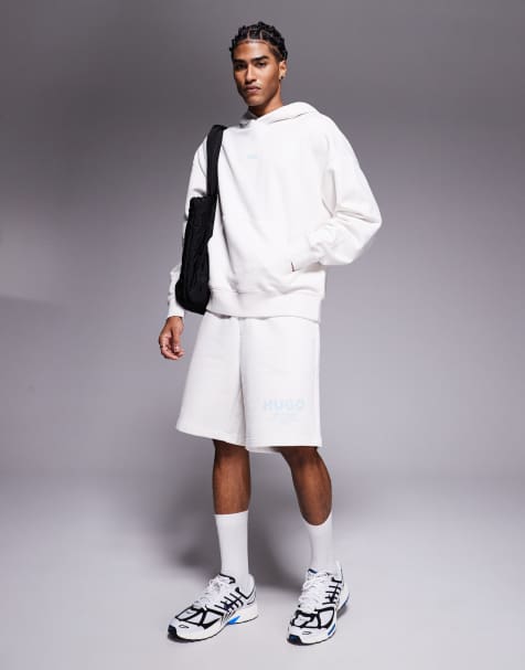 Hugo Blue co-ord loose fit jersey shorts in stone  with blue logo - view 1