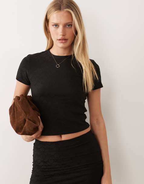 HUGO Blue - Crop top nero con stampa del logo in coordinato - view 1