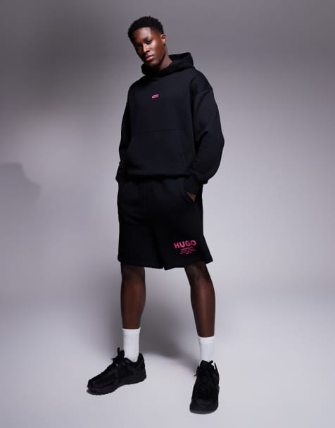 HUGO Blue loose fit jersey shorts in black with pink logo - part of a set - view 1