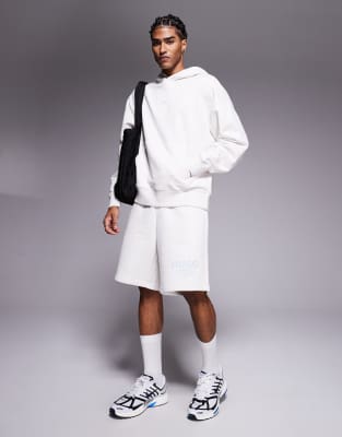 loose fit jersey shorts in stone with blue logo - part of a set-Neutral
