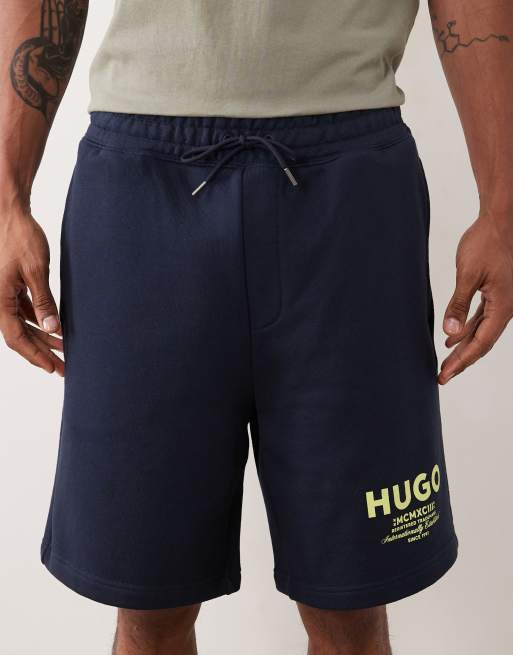HUGO Blue loose fit shorts with logo print in dark blue, 4 of 5