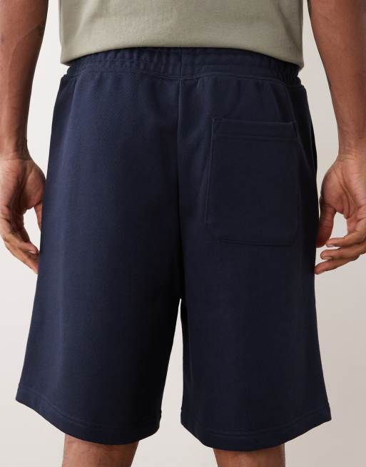 HUGO Blue loose fit shorts with logo print in dark blue, 5 of 5
