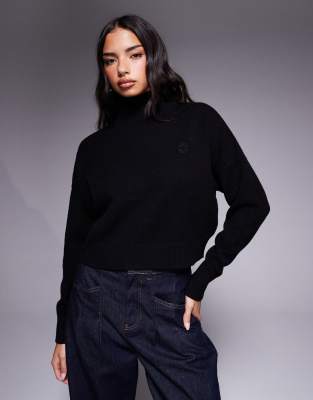 HUGO BLUE - Sesty - Hochgeschlossener Oversize-Strickpullover in Schwarz mit farblich abgestimmtem Logo