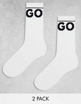 ASOS DESIGN sport socks in cream with tennis print | ASOS