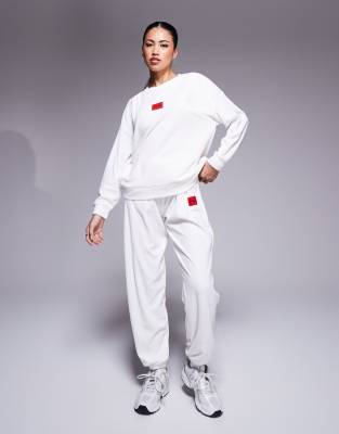 HUGO Bodywear – Neve – Naturvitt, mysigt set med sweatshirt och mjukisbyxor - view 1
