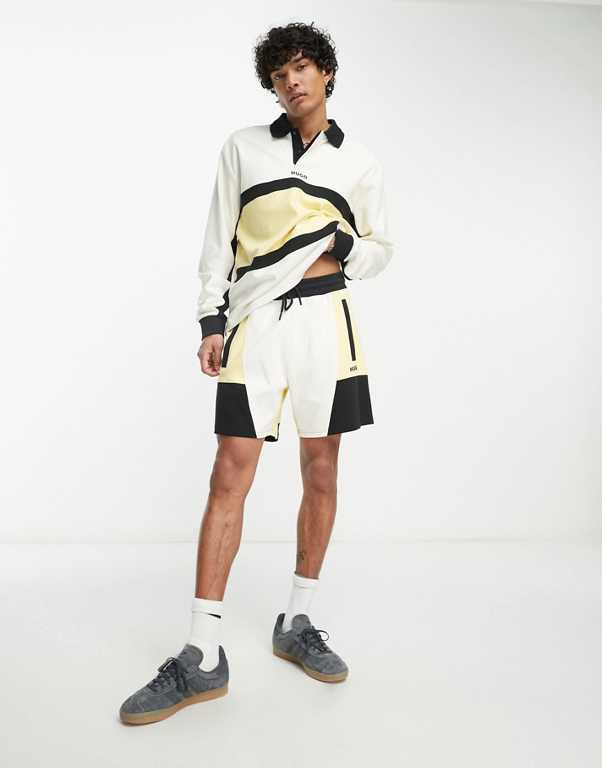 HUGO Dalvador colourblock jersey shorts in off white and yellow