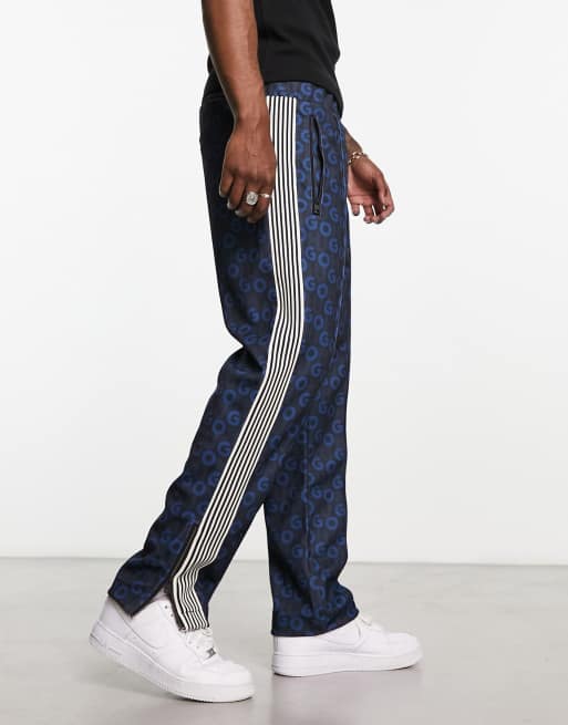 HUGO - Datalas - Pantalon de survêtement décontracté avec logo imprimé sur l'ensemble - Bleu marine