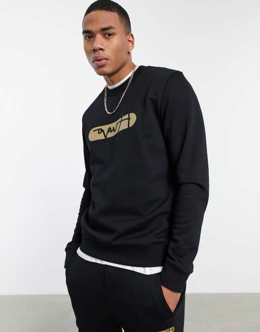 HUGO Dicago backwards logo sweat in black | ASOS