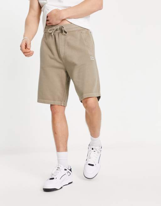 HUGO – Dinezi – Locker geschnittene Jersey-Shorts in verwaschenem Khaki