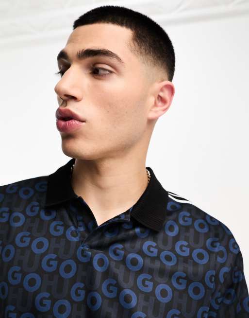 HUGO Dunlun all over logo relaxed fit polo shirt in navy, 3 of 4