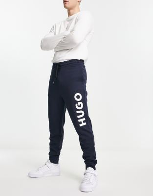 HUGO Dutschi large logo trackies in navy - ASOS Price Checker