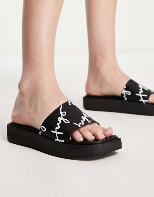 HUGO Emma platform sliders in black with script logo