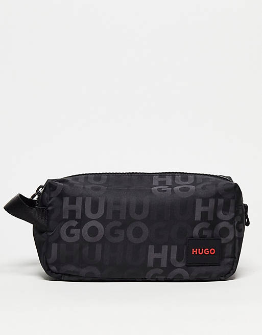 HUGO Ethon all over logo wash bag in black | ASOS