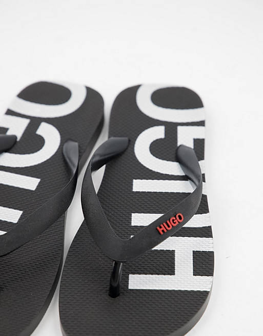 Designer Brands HUGO large contrast logo flip flops in black 