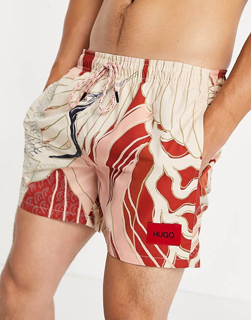 Men HUGO Miso floral allover print swim shorts with contrast box logo in pink/ white 