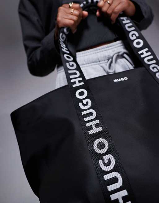 HUGO ネックポーチ レッドロゴテープ HUGO Red Bel nylon tote bag with logo handle in black | ASOS