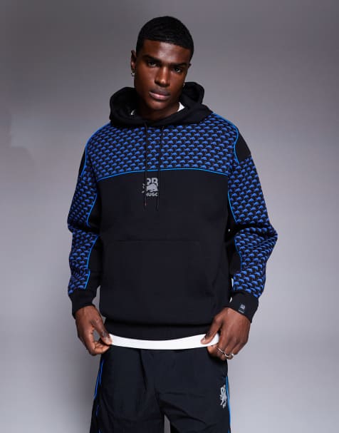 HUGO – Red Bull Racing Capsule – Dilverston – Oversize-Kapuzenpullover in Schwarz mit blauer Paspelierung und Logoprint - view 1