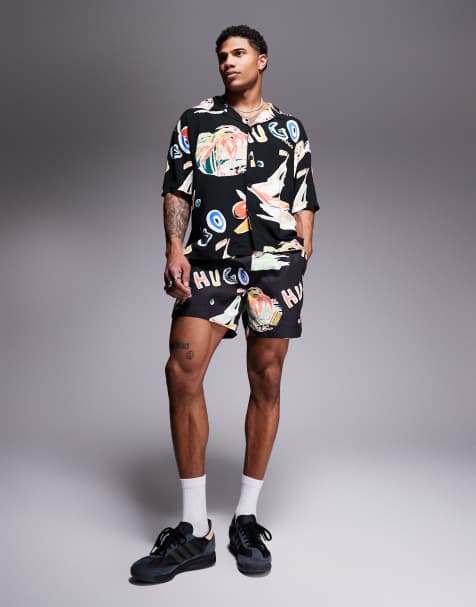HUGO Red Calala logo leaf print swim shorts in black (part of a set) - view 1
