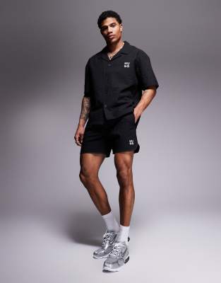 Hugo Red Hugo Red Chaffle logo waffle swim shorts in black co-ord