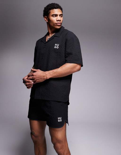 Hugo Red Chaffle logo waffle swim shorts in black co-ord, 2 of 4