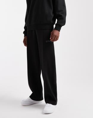 HUGO RED Dadsinolo silver logo open hem front seam sweat pants in black