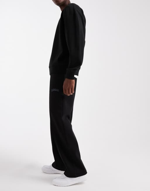 HUGO RED Dadsinolo silver logo open hem front seam sweat pants in black, 3 of 5