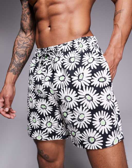 HUGO Red – Dazzy – Buntes Set mit Gänseblümchenmuster, aus kurzärmligem Strandhemd und Badeshorts, 3 von 4