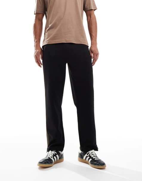 HUGO RED Dolos logo relaxed fit track pants in black - view 1