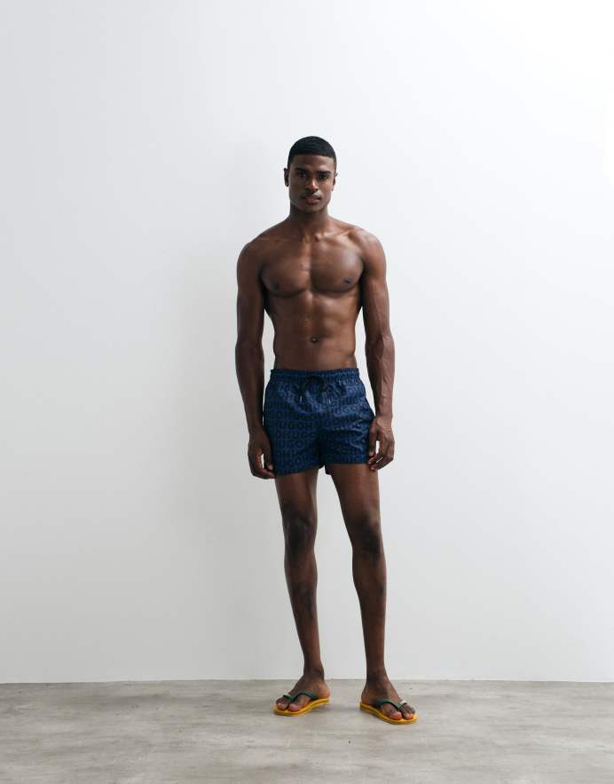 Hugo Red Shorts de baño azules con estampado integral del logo