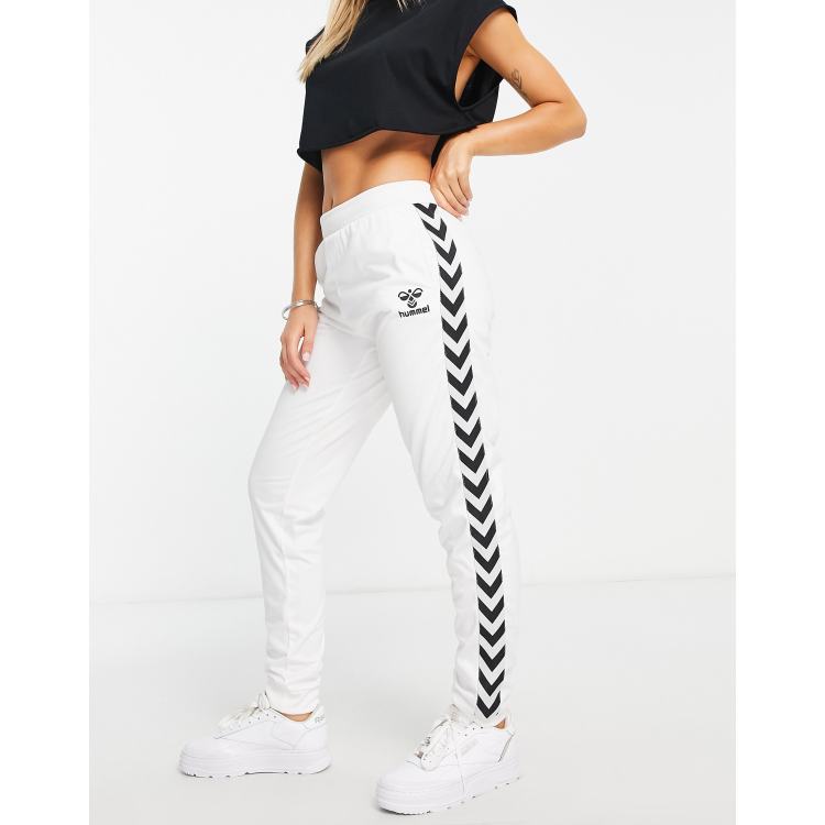 Hummel - trainingsbroek met bies in wit | ASOS