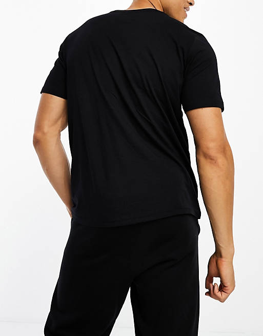Hummel regular fit T-shirt with oversized logo in black | ASOS