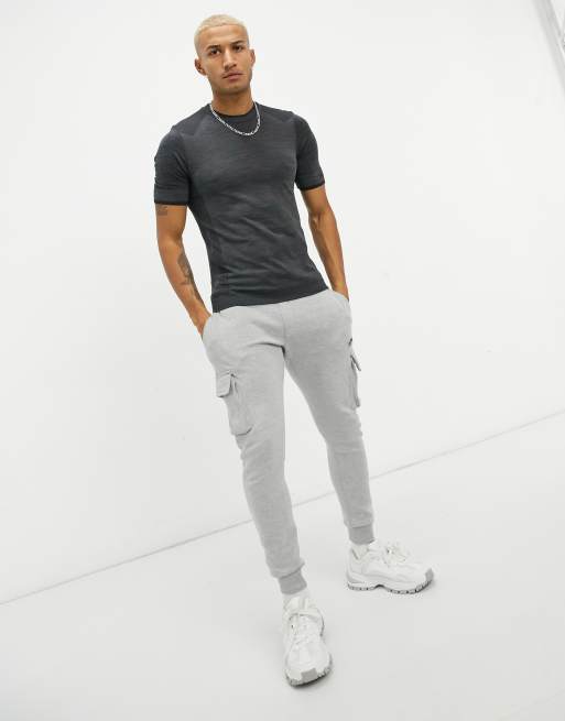 Hummel – Tracker – Bezszwowy T-shirt w kolorze czarnego melanżu, 4 z 4