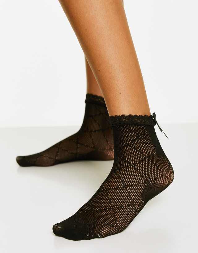 Hunkemoller mesh bow socks in black