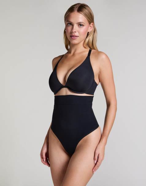 Hunkemöller – Nahtloser, figurformender Tanga in Schwarz mit hoher Taille - view 1
