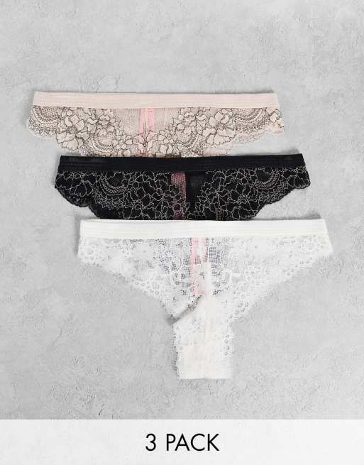 Hunkemöller – Yvo – Zestaw 3 par wysoko wyciętych fig brazylijskich z koronki w kolorze białym, czarnym i różowym