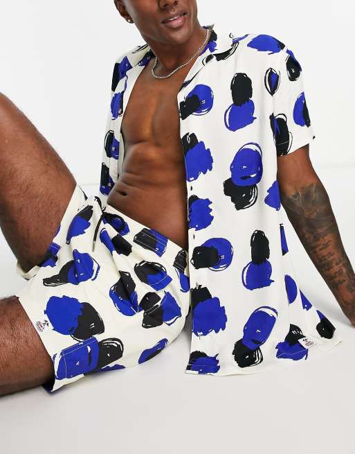 Hunky Trunks beach set in white and blue blurred spot | ASOS