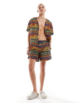 paisley swim shorts in multi - part of a set