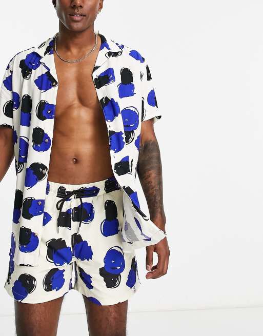Hunky Trunks beach set in white and blue blurred spot | ASOS