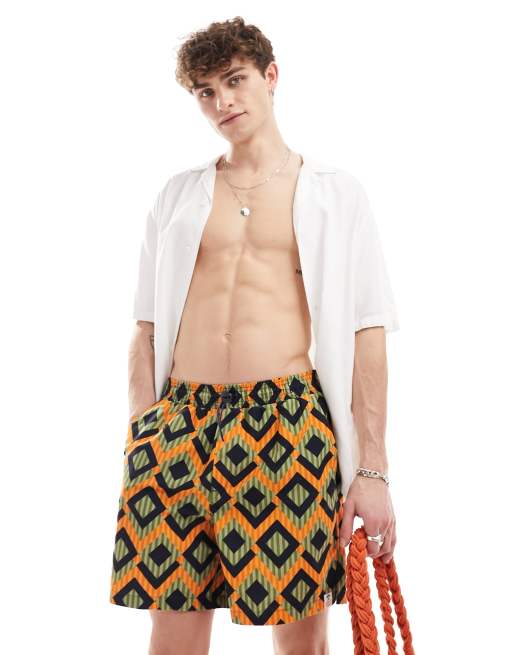 Hunky Trunks – Zielono-pomarańczowe szorty kąpielowe w geometryczny wzór w paski