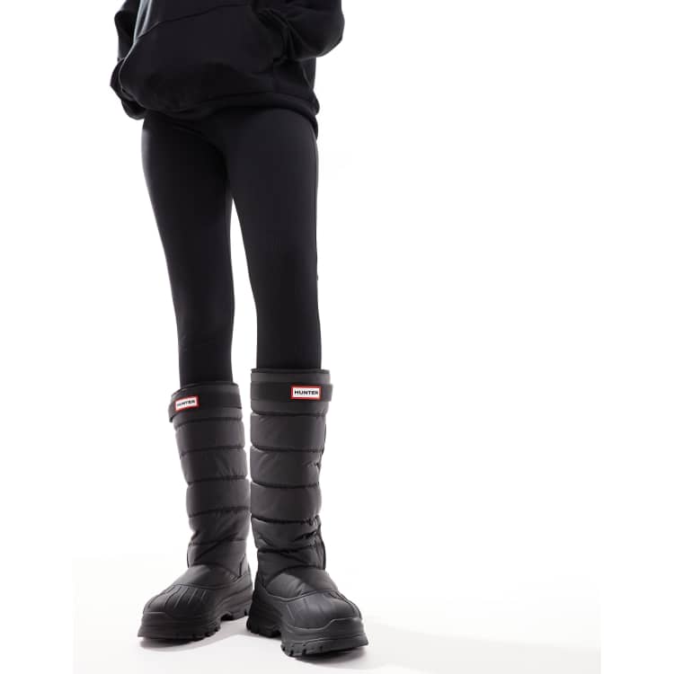 Hunter Intrepid tall buckle snow boots in black ASOS