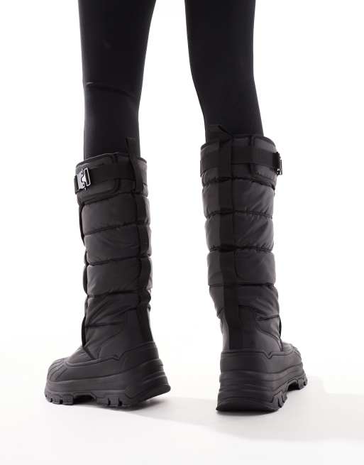 Hunter Intrepid tall buckle snow boots in black