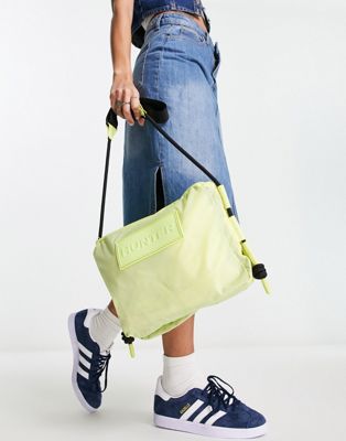 Hunter travel ripstop sacoche bag in yellow - ASOS Price Checker