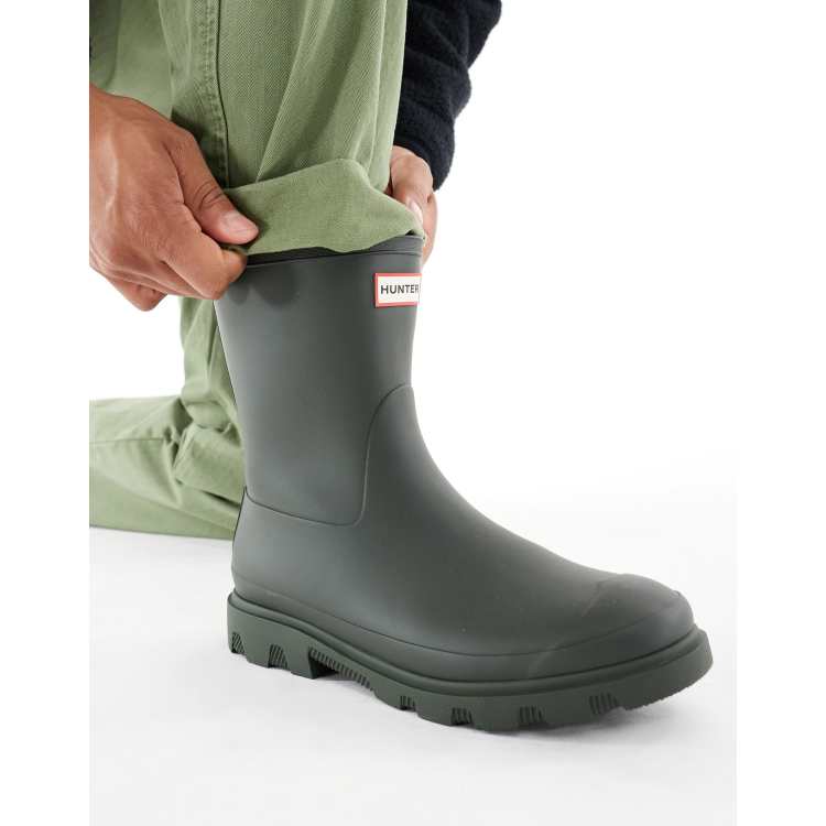 Hunter Unisex Downpour short wellington boot in dark olive ASOS