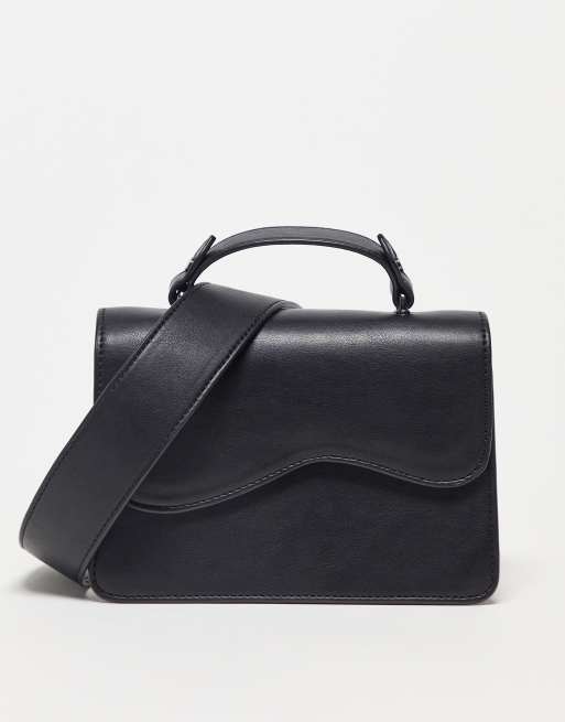 Hvisk - Crane - Borsa a tracolla in pelle vegan-friendly nera con dettaglio ondulato